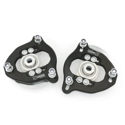Adjustable BMW E9X/E8X Front Top Mounts add camber and caster adjustment for BMW E9X/E8X front suspension setups. Featuring a super light weight design with a CNC-machined 7075-T6 aluminium bearing housing, anodized finish, and a 16 mm bearing ID, they support precise alignment tuning for fast-road and track use.