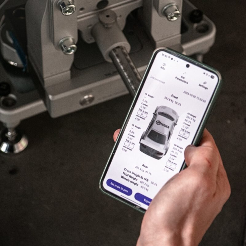 NP Hub Stand app showing corner weight and camber data on smartphone – wireless motorsport car setup software