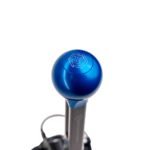Round shifter knob in blue 6082 aluminium alloy with NP Parts logo, four-bolt mount, for NP Parts short shifters from 2024