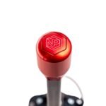 Round shifter knob in red 6082 aluminium installed on NP Parts short shifter rod, showing four-bolt mount and NP Parts logo